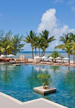 Stay in a beachfront junior suite at the Outrigger Mauritius with a free All Inclusive upgrade!