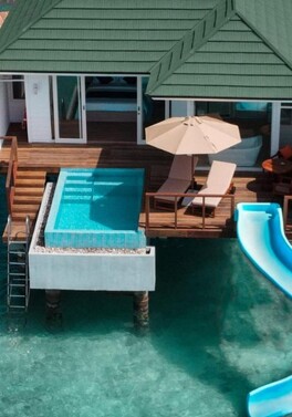 Slide into the sea from your villa with a 20% saving and free seaplane transfers!