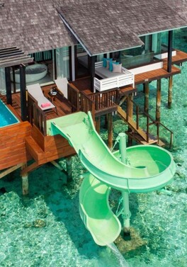 Slide into Paradise at the OZEN Life Maadhoo in the Maldives!