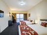 Courtyard Family Room 1 Queen and 2 Single Beds